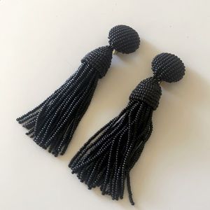 Short beaded tassel clip on earrings